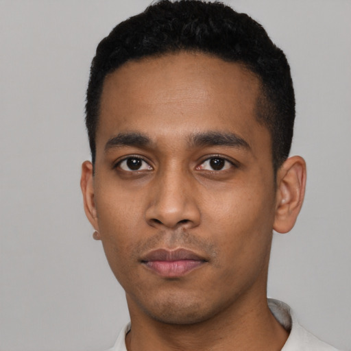 Neutral latino young-adult male with short  black hair and brown eyes