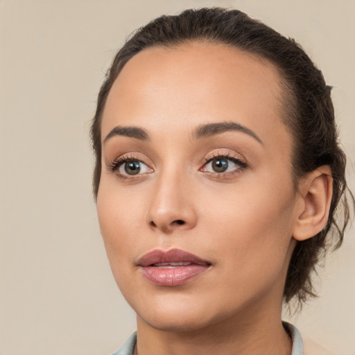 Neutral white young-adult female with long  brown hair and brown eyes