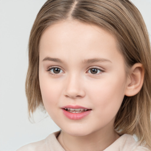 Joyful white child female with medium  brown hair and brown eyes