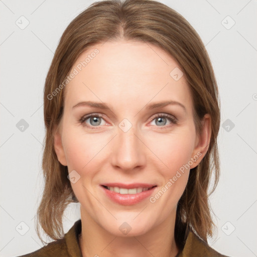 Joyful white young-adult female with medium  brown hair and blue eyes