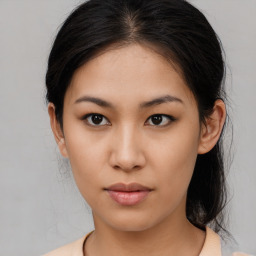 Neutral asian young-adult female with medium  brown hair and brown eyes