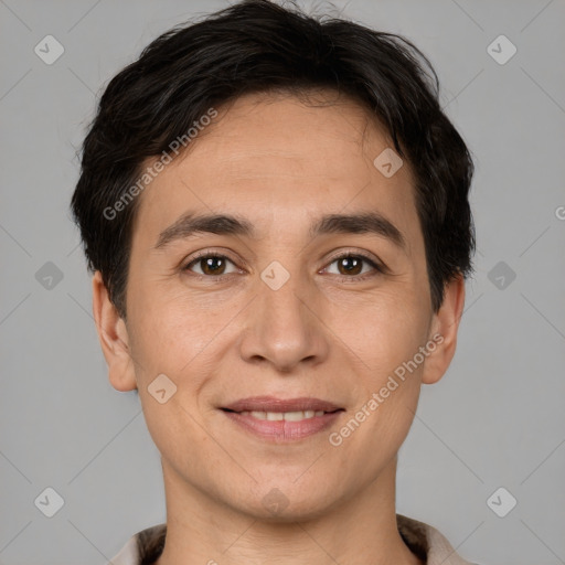 Joyful white adult male with short  brown hair and brown eyes