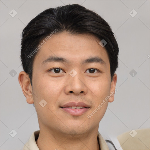 Joyful asian young-adult male with short  brown hair and brown eyes