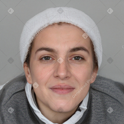 Joyful white adult female with short  brown hair and brown eyes