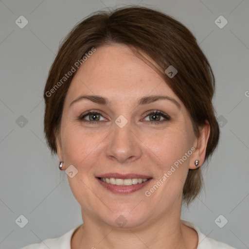 Joyful white adult female with medium  brown hair and grey eyes