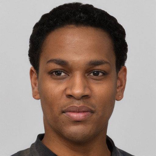 Neutral black young-adult male with short  black hair and brown eyes