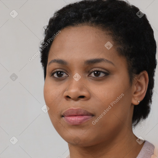 Neutral black young-adult female with short  black hair and brown eyes