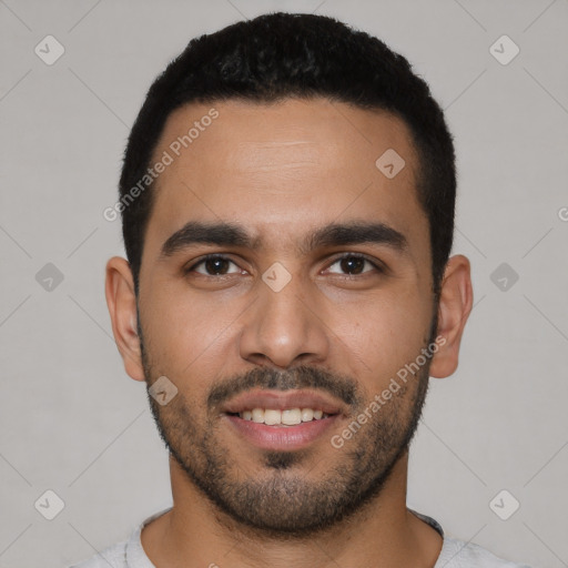 Joyful latino young-adult male with short  black hair and brown eyes