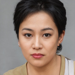 Neutral asian young-adult female with medium  brown hair and brown eyes