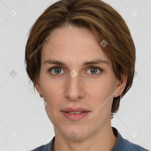 Joyful white adult female with short  brown hair and grey eyes