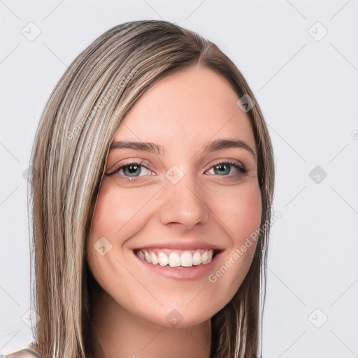 Joyful white young-adult female with long  brown hair and blue eyes