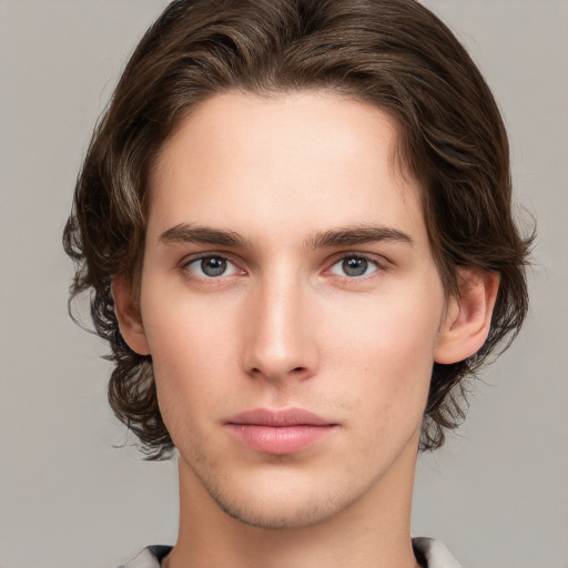 Neutral white young-adult male with medium  brown hair and brown eyes