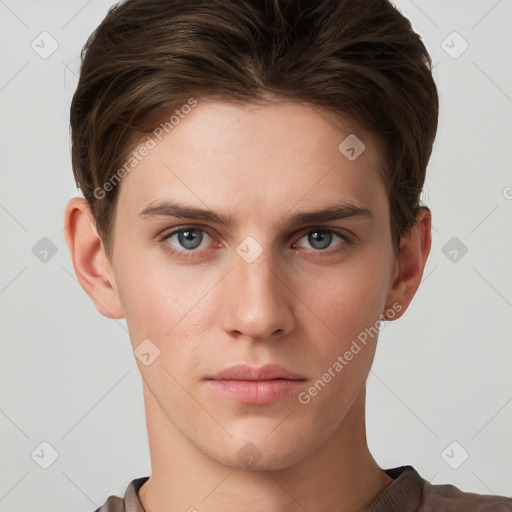 Neutral white young-adult male with short  brown hair and grey eyes