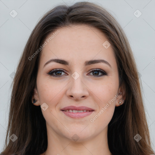 Joyful white young-adult female with long  brown hair and grey eyes