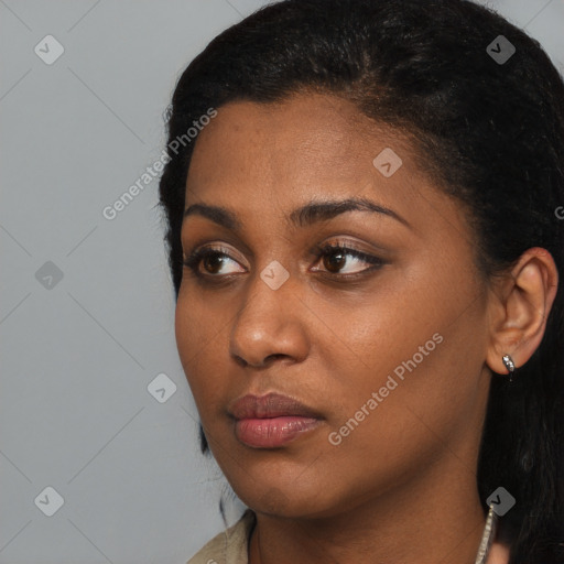 Neutral black young-adult female with short  brown hair and brown eyes