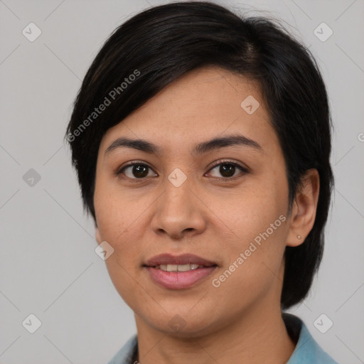 Joyful asian young-adult female with medium  black hair and brown eyes