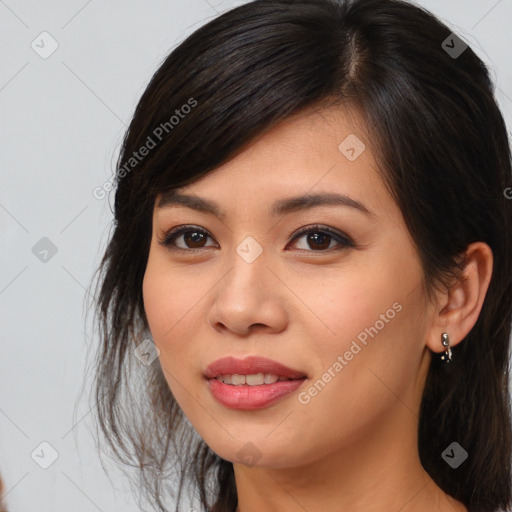 Joyful asian young-adult female with medium  brown hair and brown eyes