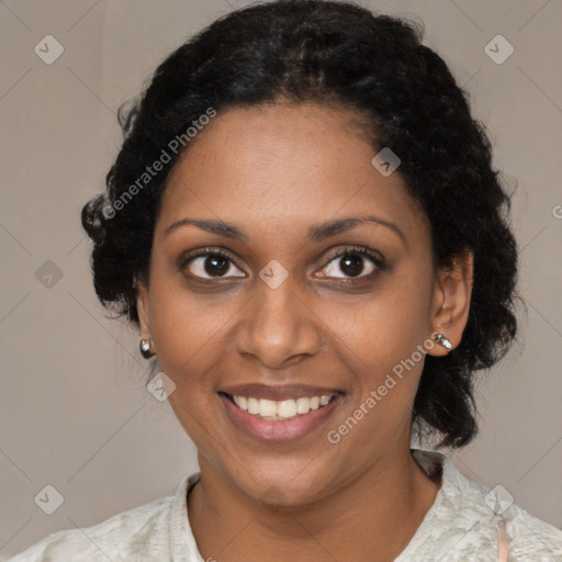 Joyful black young-adult female with medium  brown hair and brown eyes