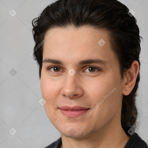 Joyful white adult female with medium  brown hair and brown eyes