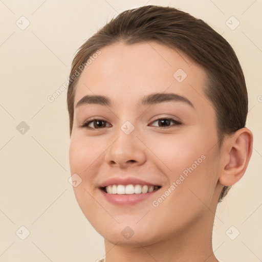 Joyful white young-adult female with short  brown hair and brown eyes