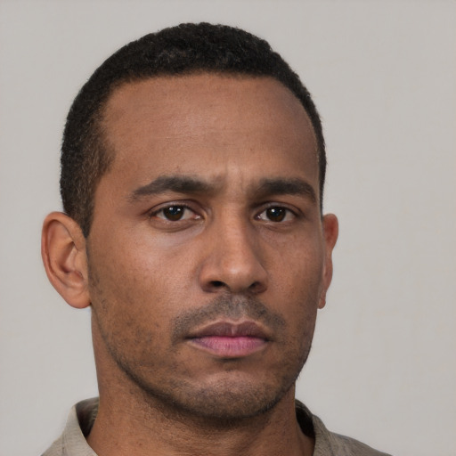 Neutral latino young-adult male with short  brown hair and brown eyes