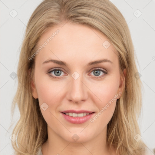 Joyful white young-adult female with long  brown hair and blue eyes