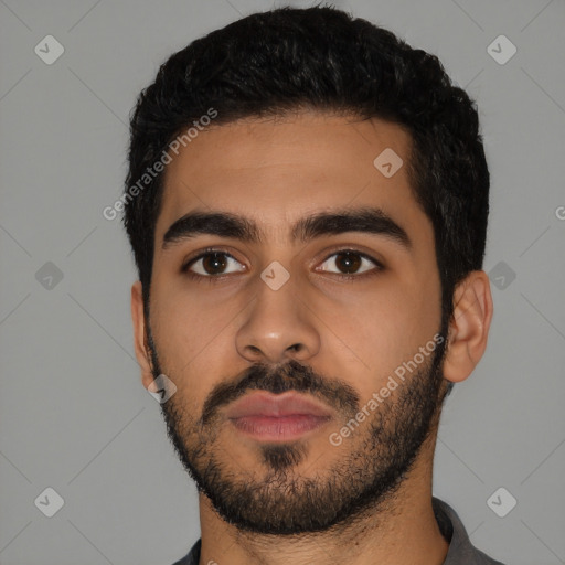 Neutral latino young-adult male with short  black hair and brown eyes