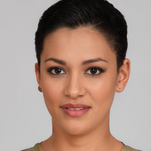 Joyful latino young-adult female with short  brown hair and brown eyes