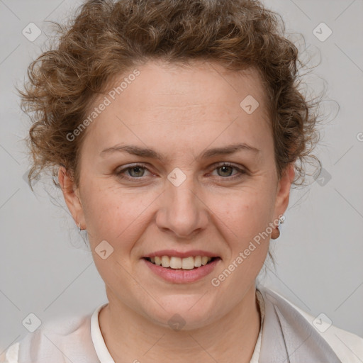 Joyful white adult female with short  brown hair and brown eyes