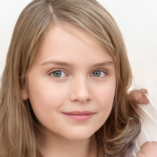 Joyful white child female with long  brown hair and brown eyes