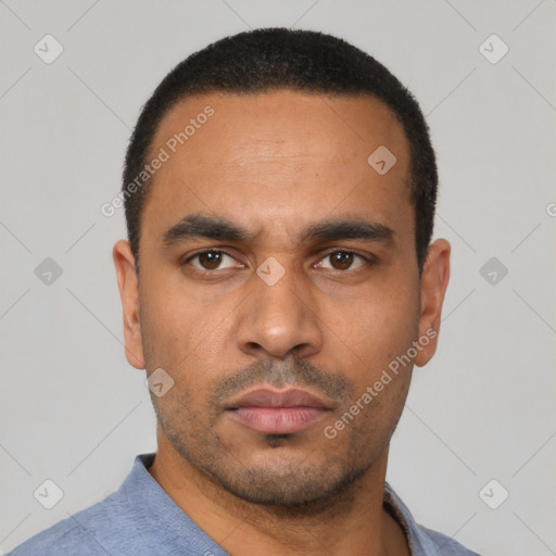 Neutral latino young-adult male with short  black hair and brown eyes