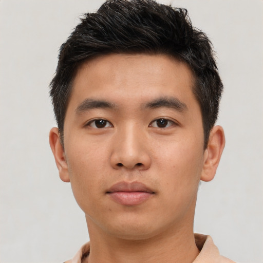 Neutral asian young-adult male with short  brown hair and brown eyes