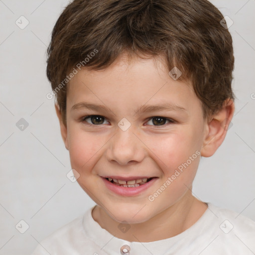 Joyful white child male with short  brown hair and brown eyes