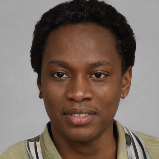 Joyful black young-adult female with short  black hair and brown eyes