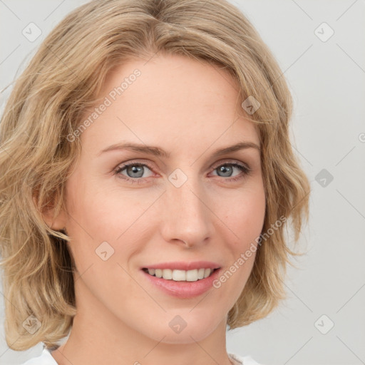 Joyful white young-adult female with medium  brown hair and blue eyes