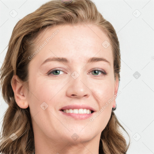 Joyful white young-adult female with long  brown hair and blue eyes