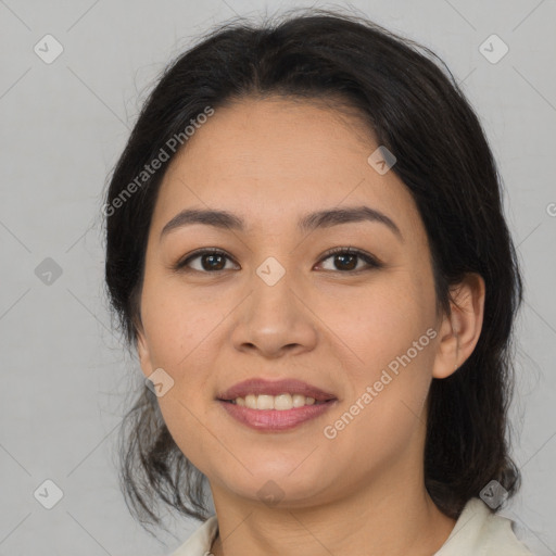 Joyful latino young-adult female with medium  brown hair and brown eyes