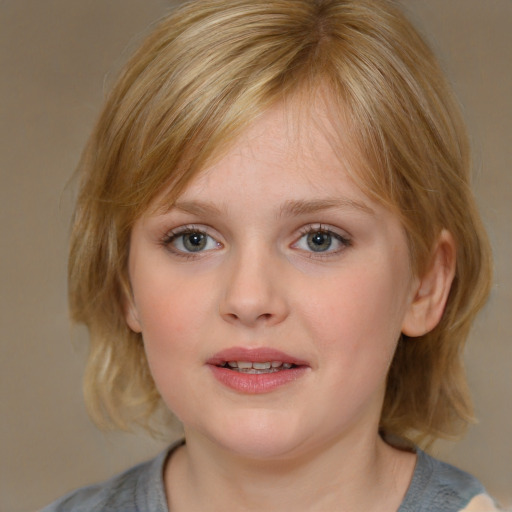 Joyful white child female with medium  brown hair and blue eyes