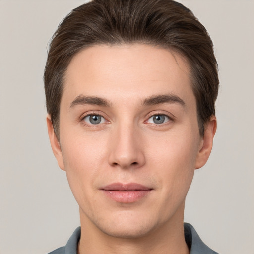 Neutral white young-adult male with short  brown hair and brown eyes