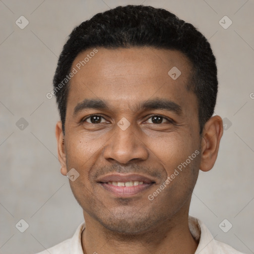 Joyful latino young-adult male with short  black hair and brown eyes