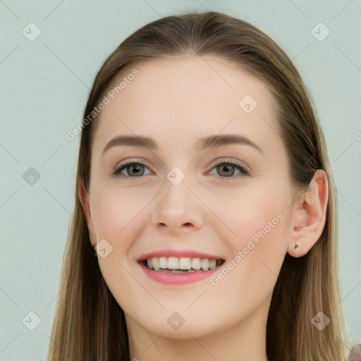 Joyful white young-adult female with long  brown hair and blue eyes