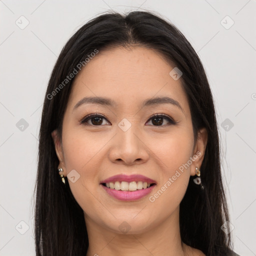 Joyful latino young-adult female with long  brown hair and brown eyes