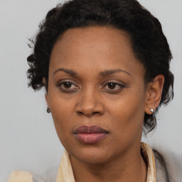 Neutral black adult female with short  black hair and brown eyes