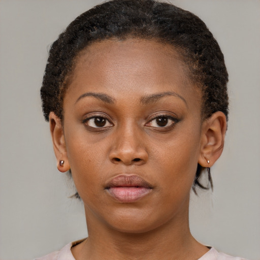 Neutral black young-adult female with short  brown hair and brown eyes