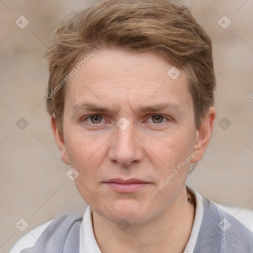 Joyful white adult male with short  brown hair and grey eyes