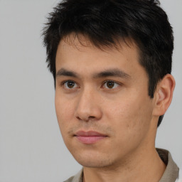 Neutral asian young-adult male with short  brown hair and brown eyes