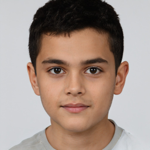 Neutral latino child male with short  brown hair and brown eyes