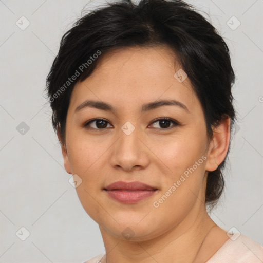 Joyful asian young-adult female with short  brown hair and brown eyes