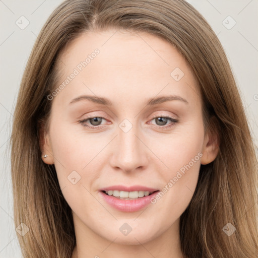 Joyful white young-adult female with long  brown hair and grey eyes