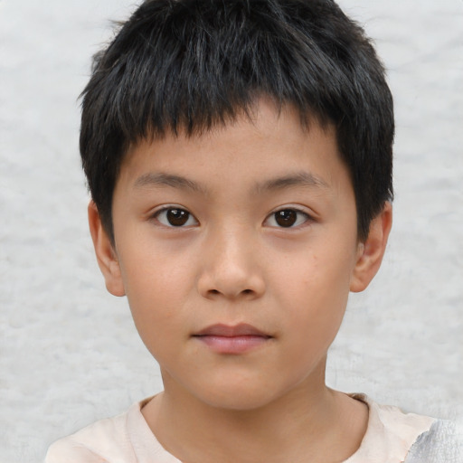 Neutral asian child male with short  brown hair and brown eyes